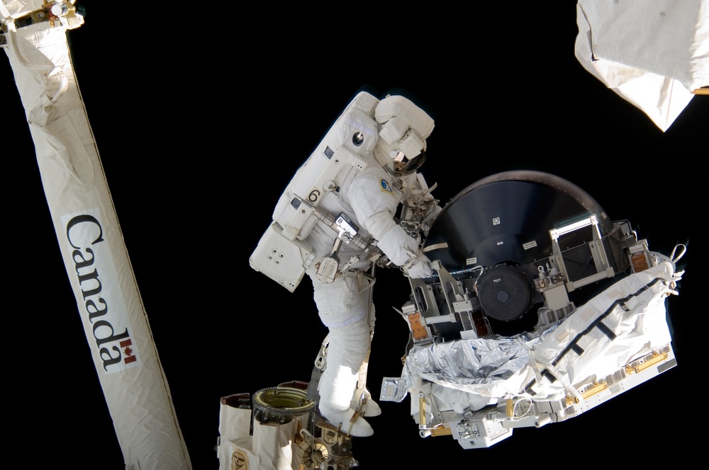 View of MS Williams transporting the new CMG to the ESP2 during EVA 2