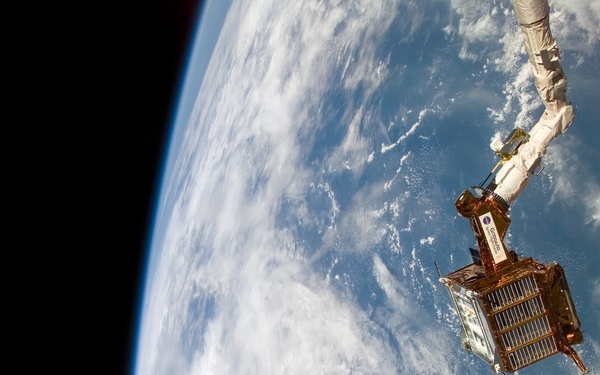 SPARTAN satellite on RMS arm