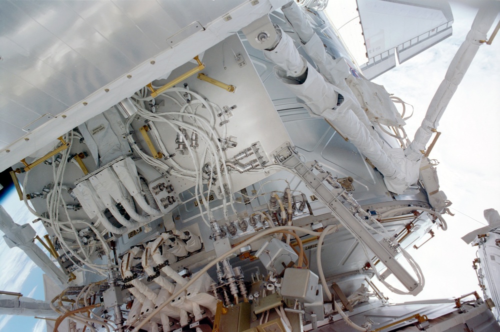 View of the aft avionics tray between the Z1 and S0 Trusses taken during the fourth EVA of STS-110