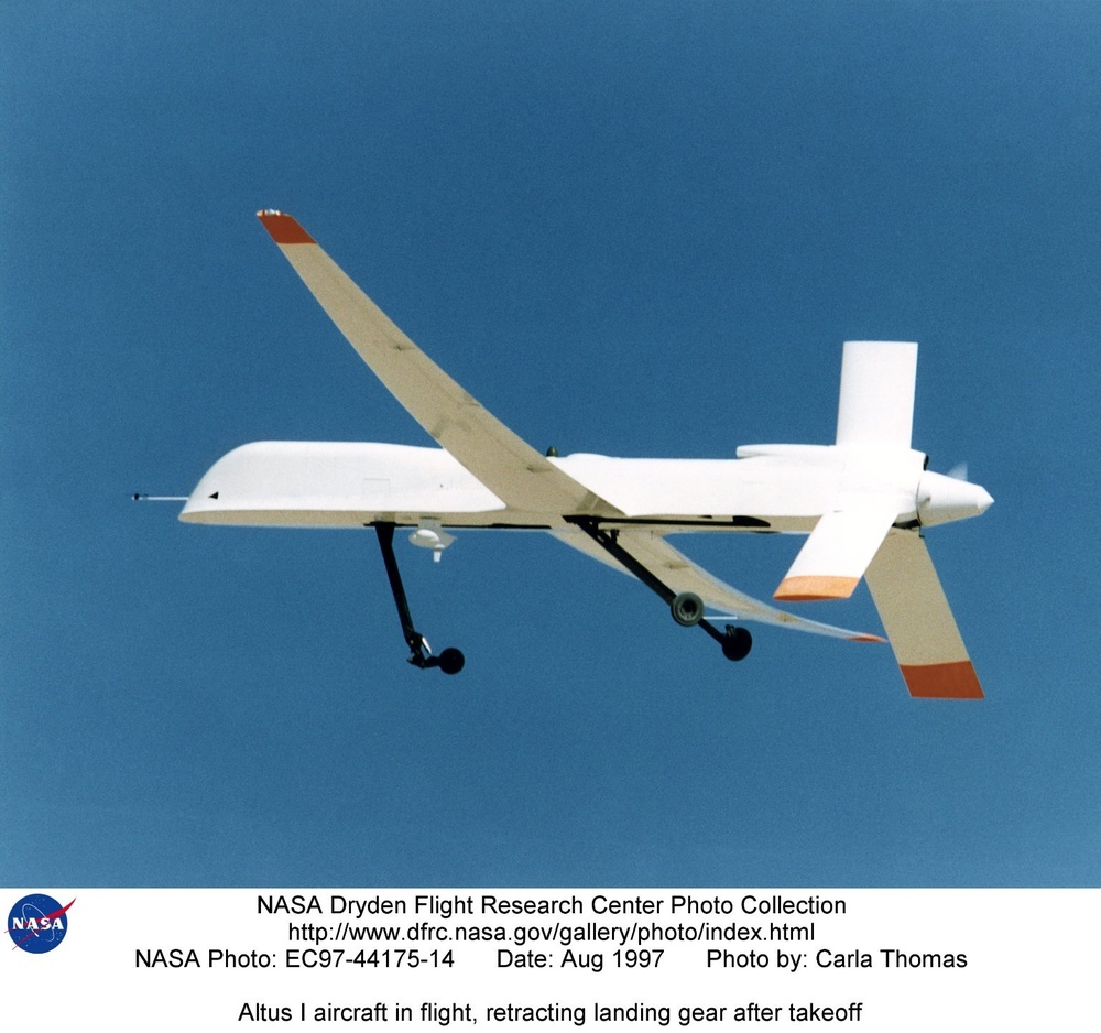 Altus I aircraft in flight, retracting landing gear after takeoff