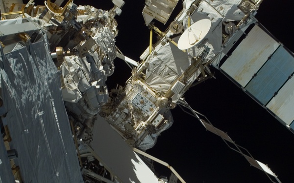 EVA view of the P1 Truss aft radiator and port side of the P6 Truss and Z1 Truss during STS-115 mission