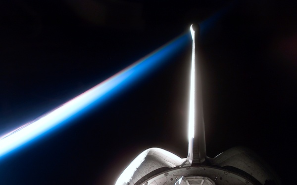 Spacehab RDM in Columbia's PLB backdropped by Earth's limb during STS-107