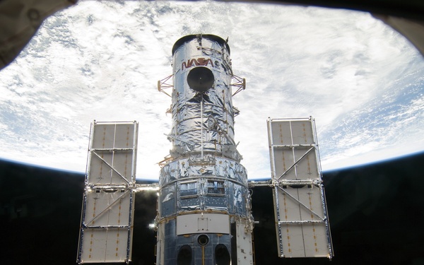 View of the HST docked with the Space Shuttle Atlantis