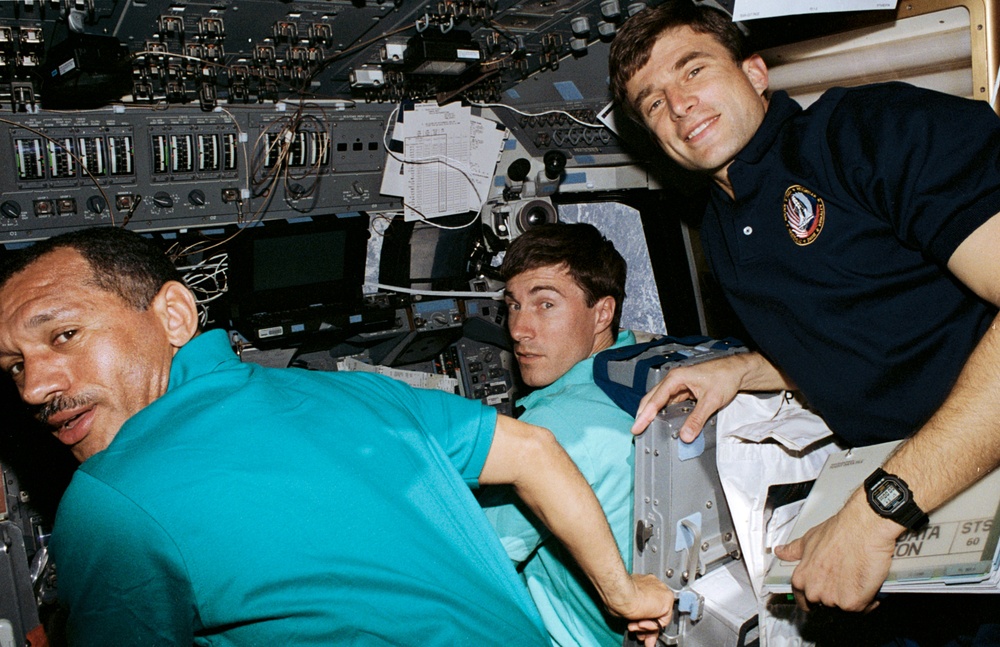 Bolden, Krikalev and Sega on forward flight deck