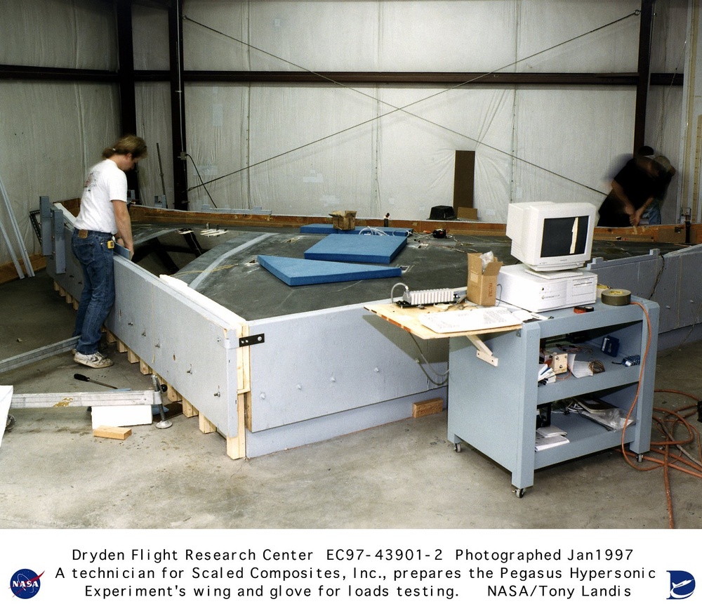 Pegasus Rocket Wing and PHYSX Glove Being Prepared for Stress Loads Testing