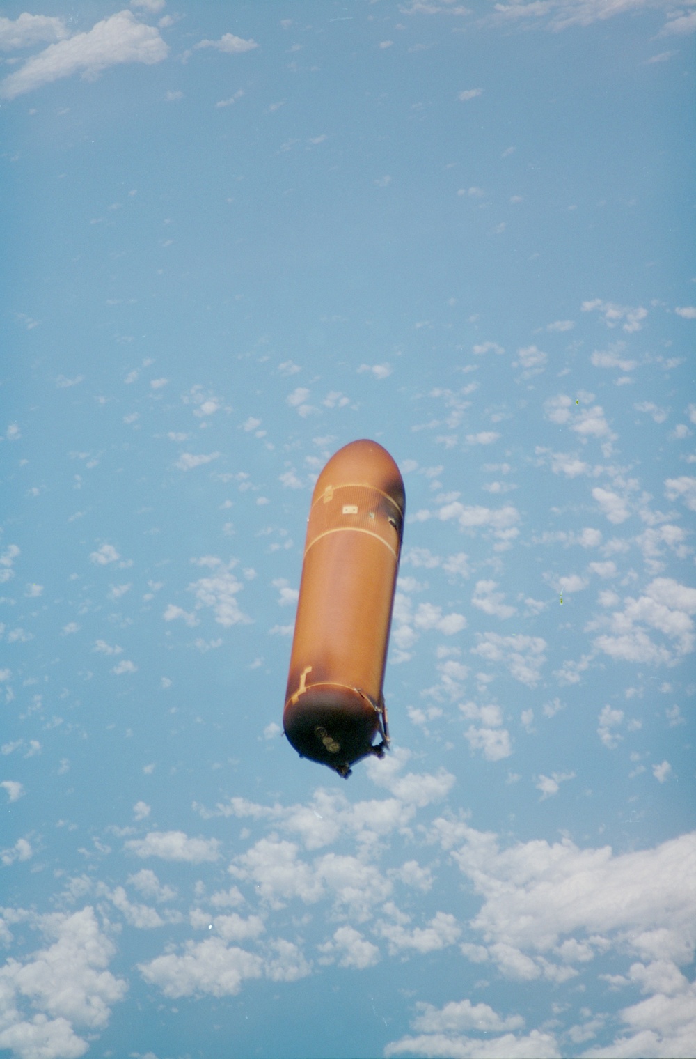 Views of the external tank as it falls away from Discovery