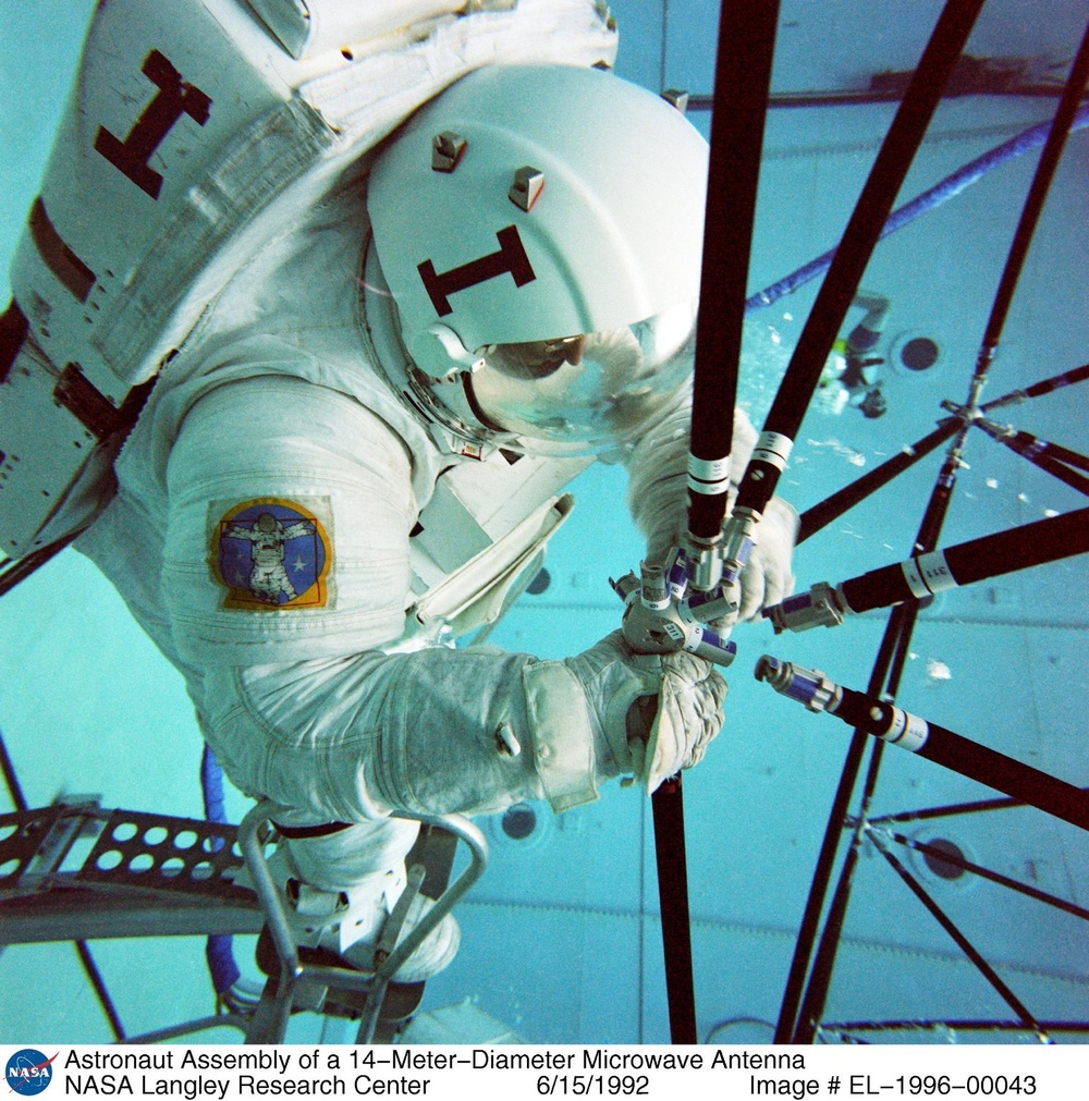 Astronaut Assembly of a 14-Meter-Diameter Microwave Antenna