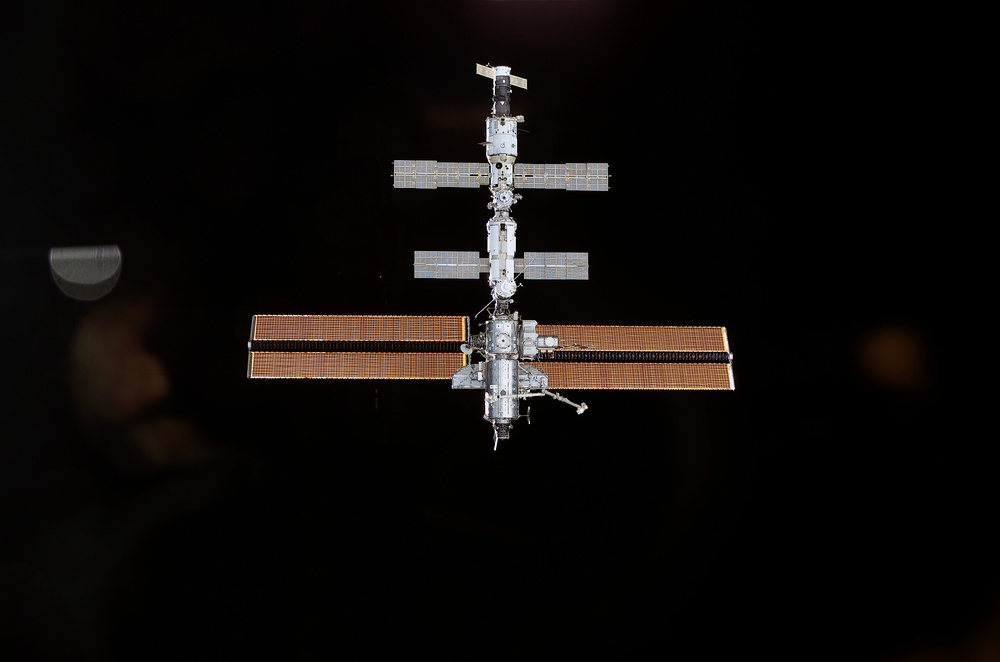 View of the ISS against the blackness of space as photographed by an STS-111 UF-2 crewmember