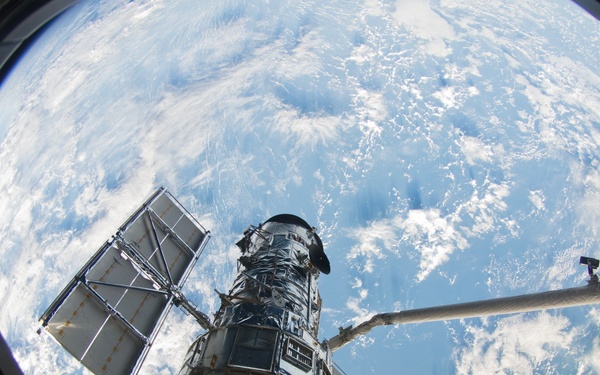 Hubble Space Telescope (HST) during rendezvous with STS-125 Shuttle Atlantis