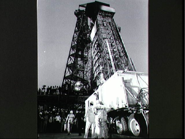 Astronaut Gordon Cooper walks to elevator to spacecraft &quot;Faith 7