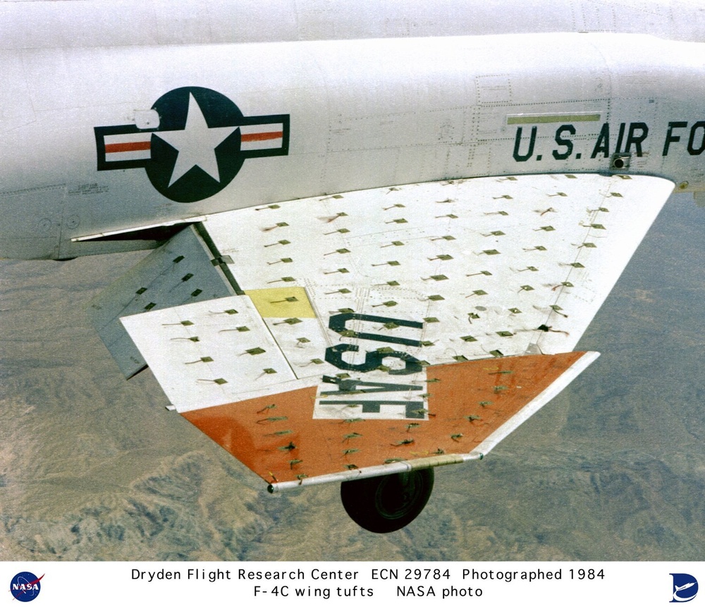 F-4C in flight closup of wing showing wing tufts