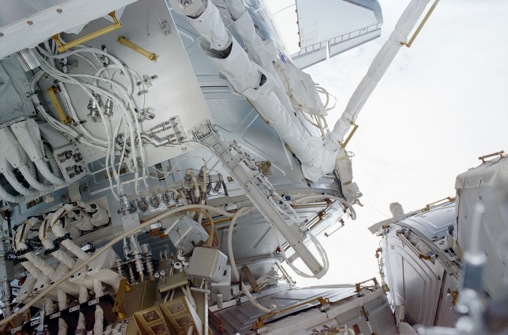 View of the aft avionics tray between the Z1 and S0 Trusses taken during the fourth EVA of STS-110