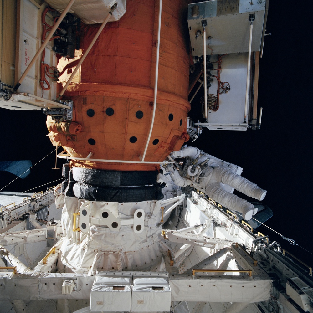 Astronauts Linda Godwin and Michael ''Rich'' Clifford during EVA