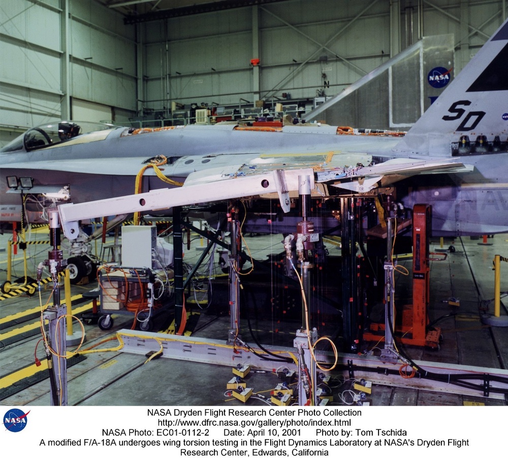 A modified F/A-18A undergoes wing torsion testing in the Flight Dynamics Laboratory at NASA's Dryden