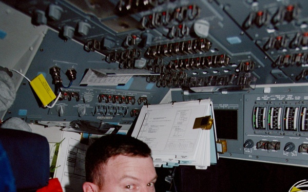 Various crewmembers in the orbiter flight deck