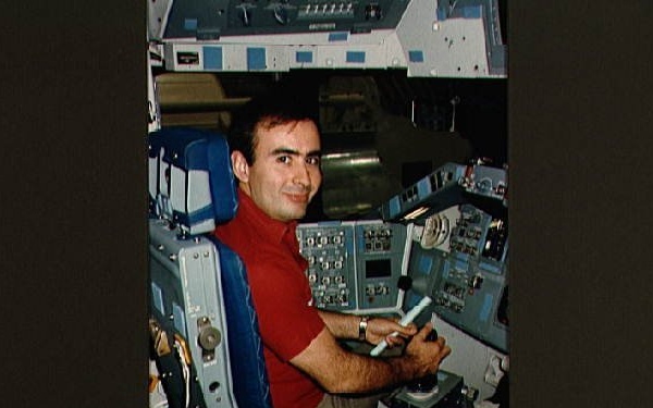 Payload specialist Rudolfo Neri in Shuttle Mission Simulator