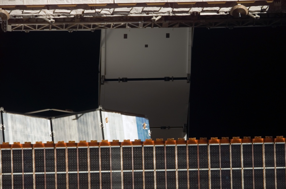View of the S1 Radiator and P6 Solar Arrays taken from the orbiter after undocking from the ISS during  STS-121