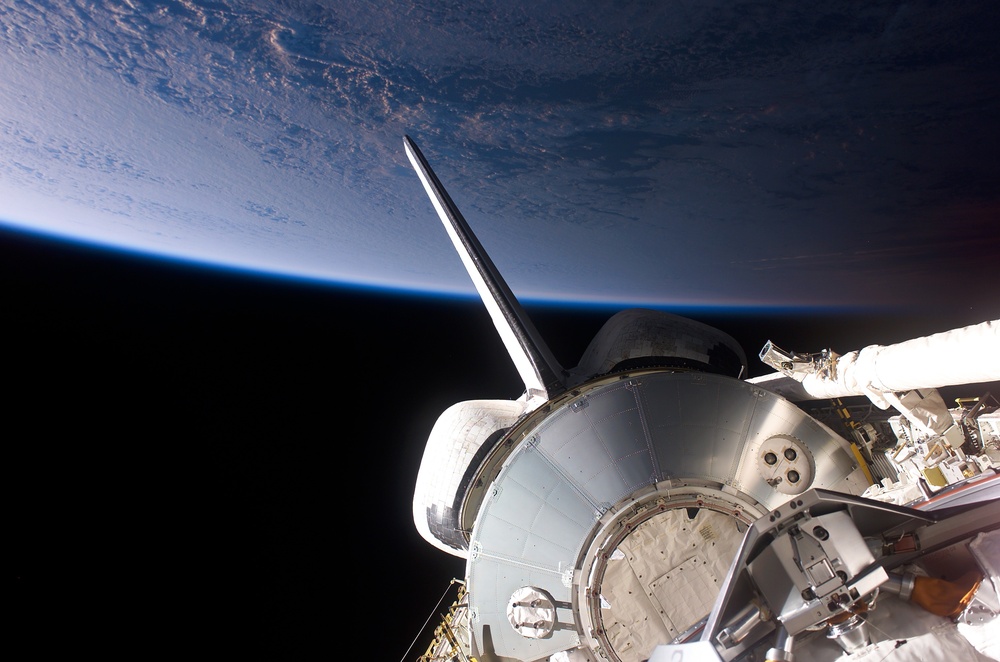 Leonardo MPLM in Endeavour's aft PLB backdropped against Earth limb during STS-111 UF-2