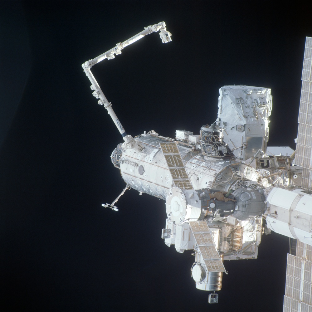 View of the aft - nadir side of the ISS taken during STS-110's flyaround