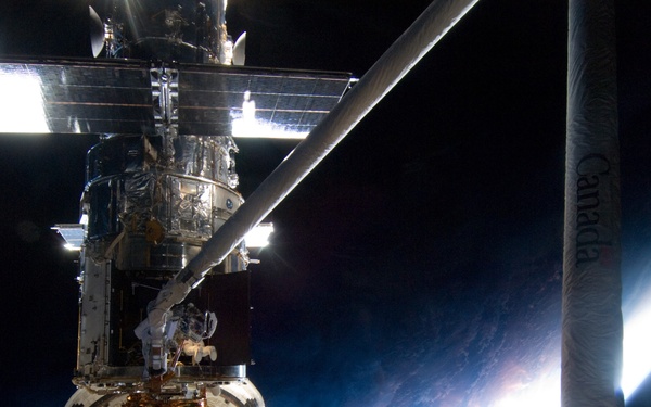 STS-125 MS1 Good and MS4 Massimino during EVA4