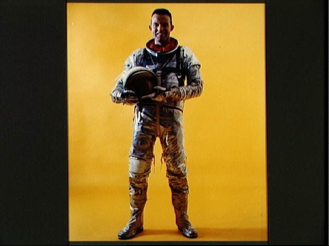 Full-length portrait of Mercury Astronaut L. Gordon Cooper Jr. in spacesuit