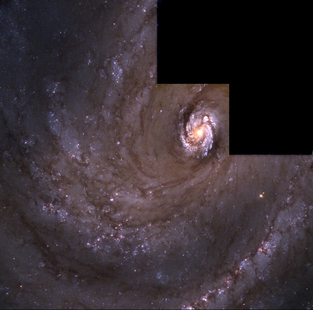 The Spiral Galaxy M100 as Seen With the Hubble's Improved Vision
