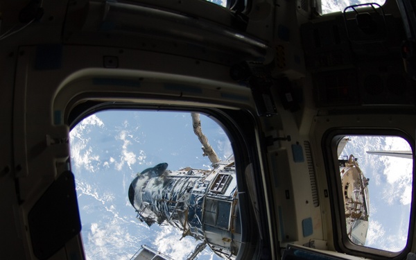 Hubble Space Telescope (HST) during rendezvous with STS-125 Shuttle Atlantis