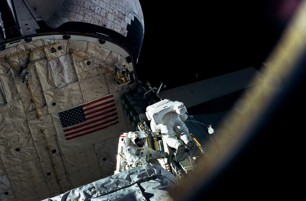 Astronauts Linda Godwin and Michael ''Rich'' Clifford perform EVA