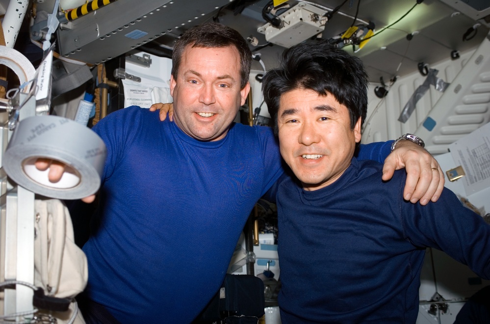Linnehan and Doi in the MDDK during STS-123
