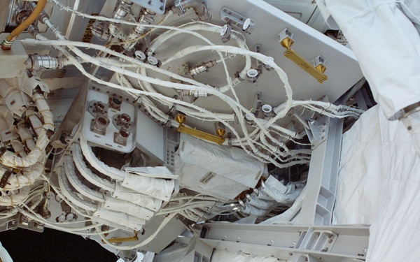 View of the aft avionics tray between the Z1 and S0 Trusses taken during the fourth EVA of STS-110