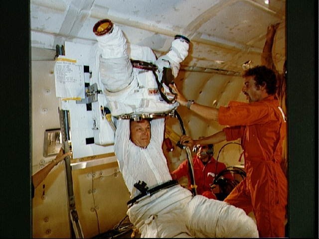 Spacsuit donning and doffing in zero-g training for Story Musgrave STS-6