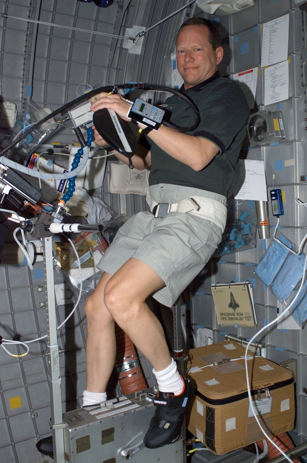 Brown exercises on the Ergometer as part of ARMS experiment in Spacehab RDM during STS-107