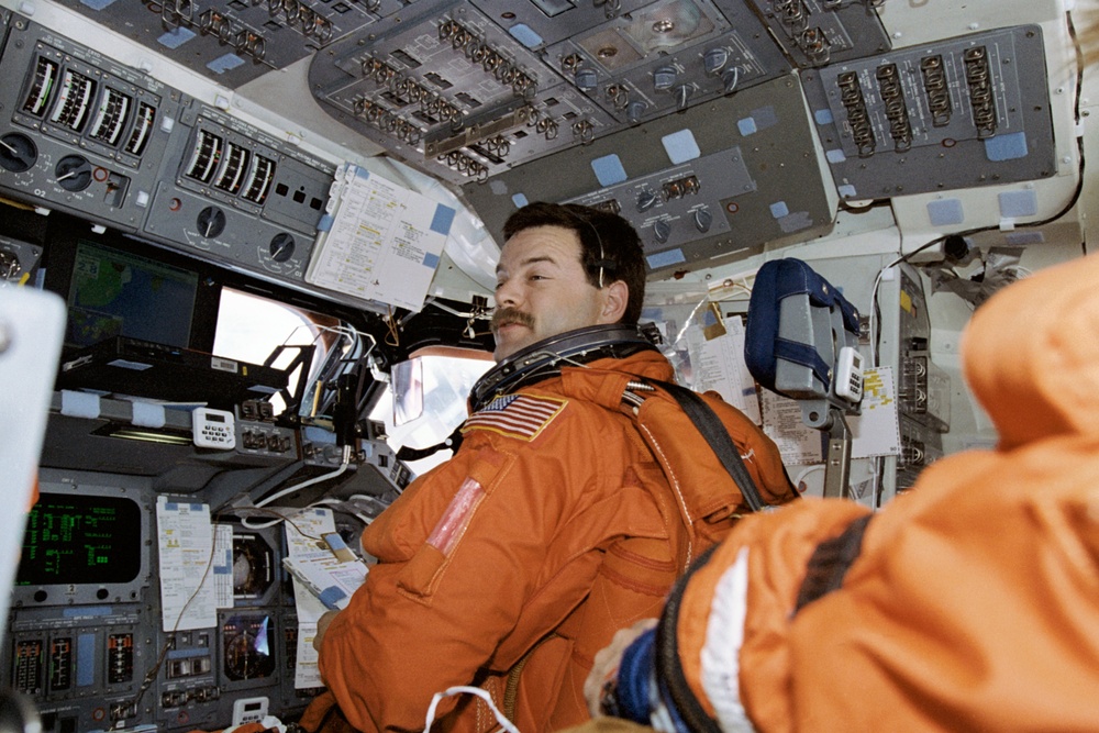 Various views of STS-90 crew on the flight deck prior to landing