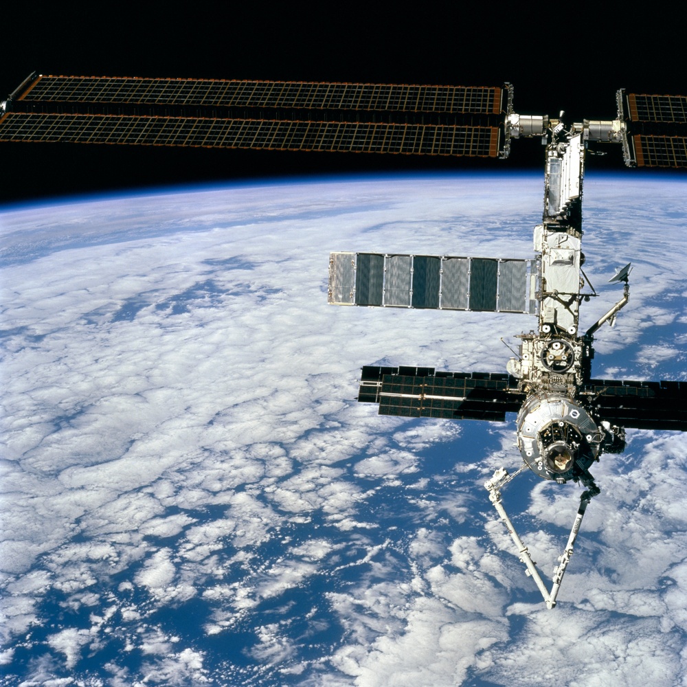 Forward view of the ISS taken during the final flyaround of the STS-100 mission