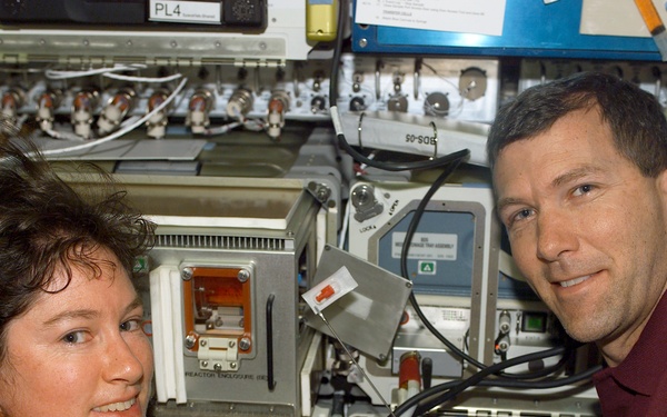 Clark and Husband in the Spacehab RDM during activation procedures on STS-107