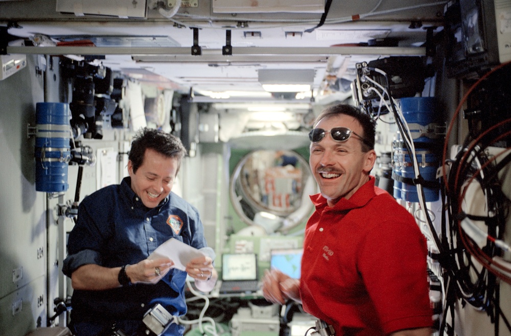 Bursch and Smith in the Service Module during STS-110