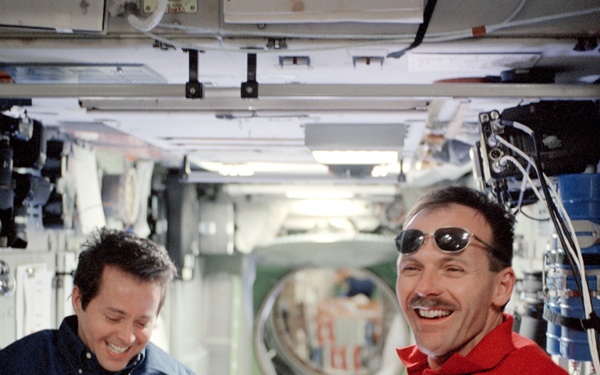 Bursch and Smith in the Service Module during STS-110