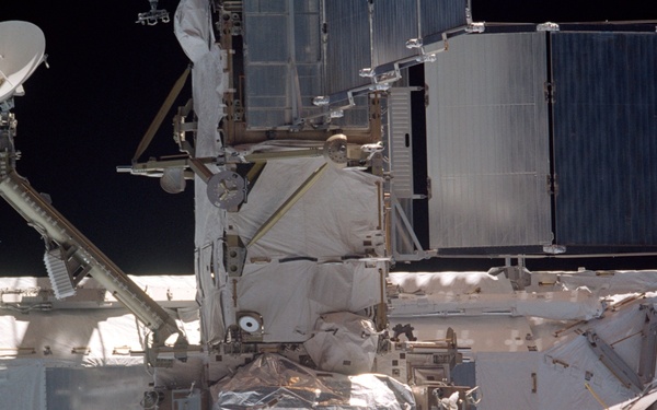 View of the aft nadir side of the P6 Truss, S0 Truss and Zvezda taken during STS-110