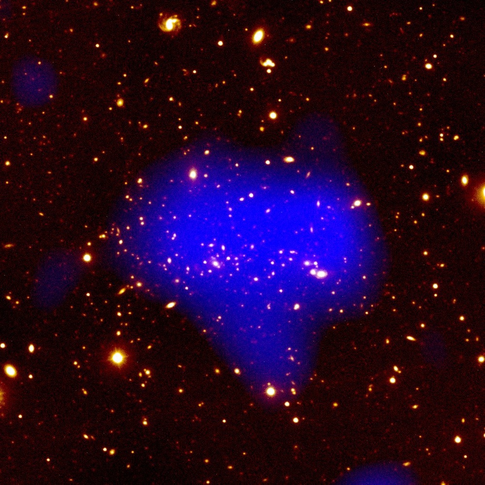 Distant Heavyweight Galaxy Cluster Clobbers Dense-Universe Theory