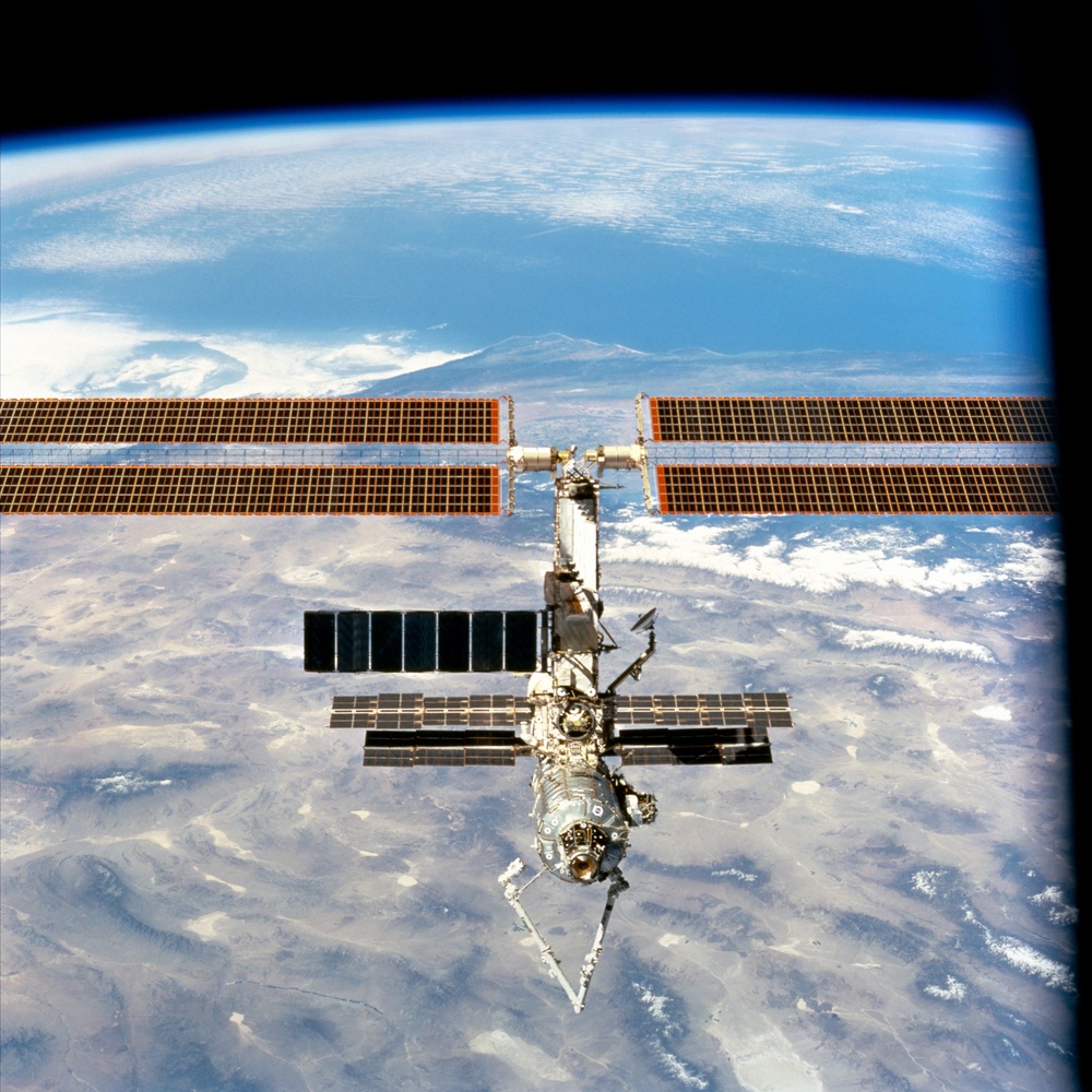 Forward view of the ISS taken during the final flyaround of the STS-100 mission