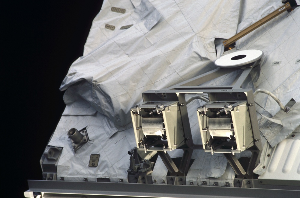 View of UMA's, a WIF and EVA handrails on the S0 Truss taken during STS-110