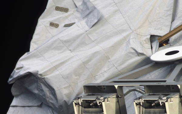 View of UMA's, a WIF and EVA handrails on the S0 Truss taken during STS-110