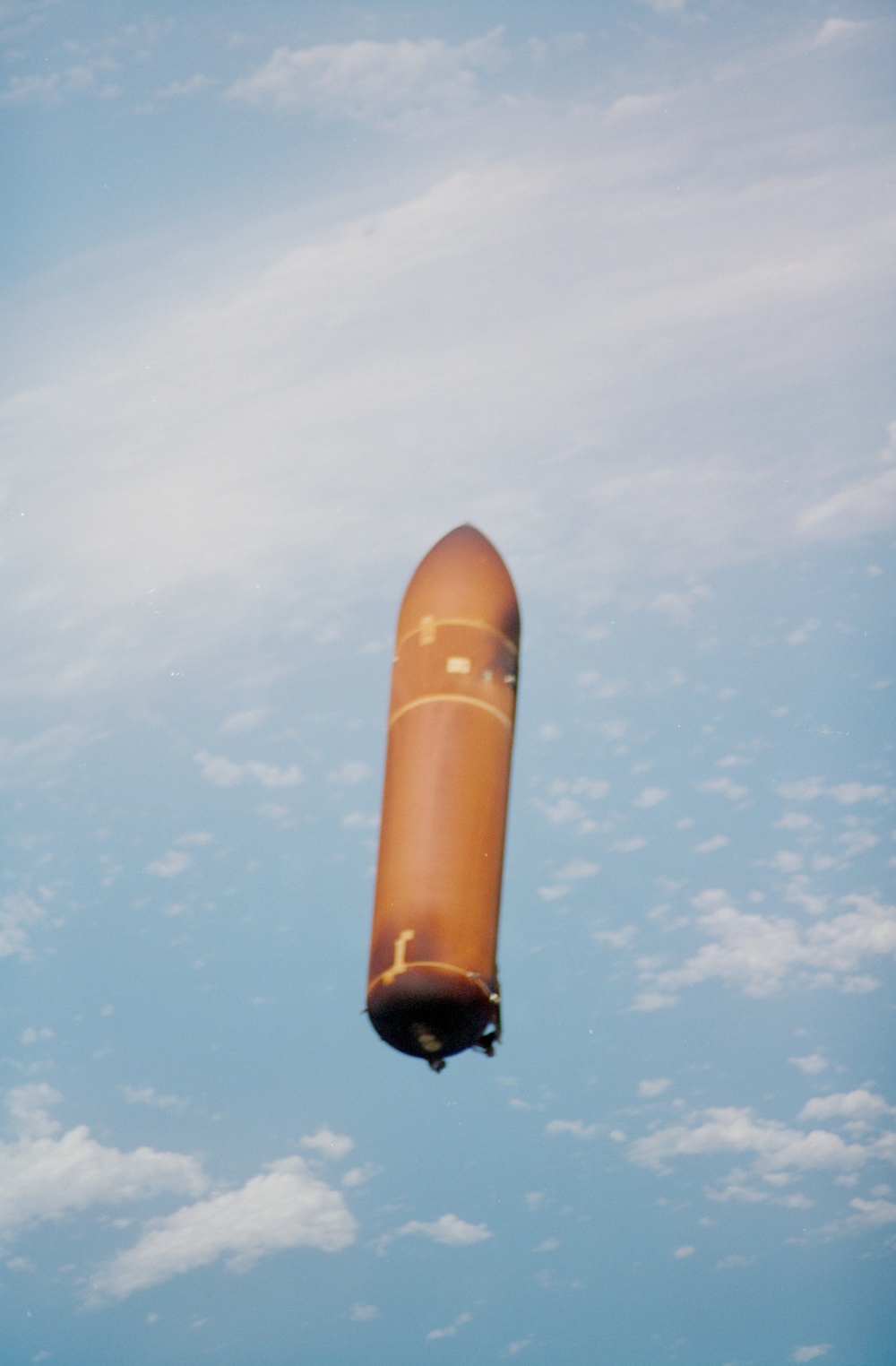 Views of the external tank as it falls away from Discovery