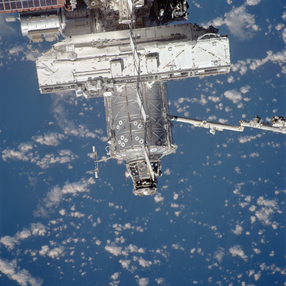 View of the zenith side of the S0 Truss and U.S. Laboratory taken during STS-110's flyaround