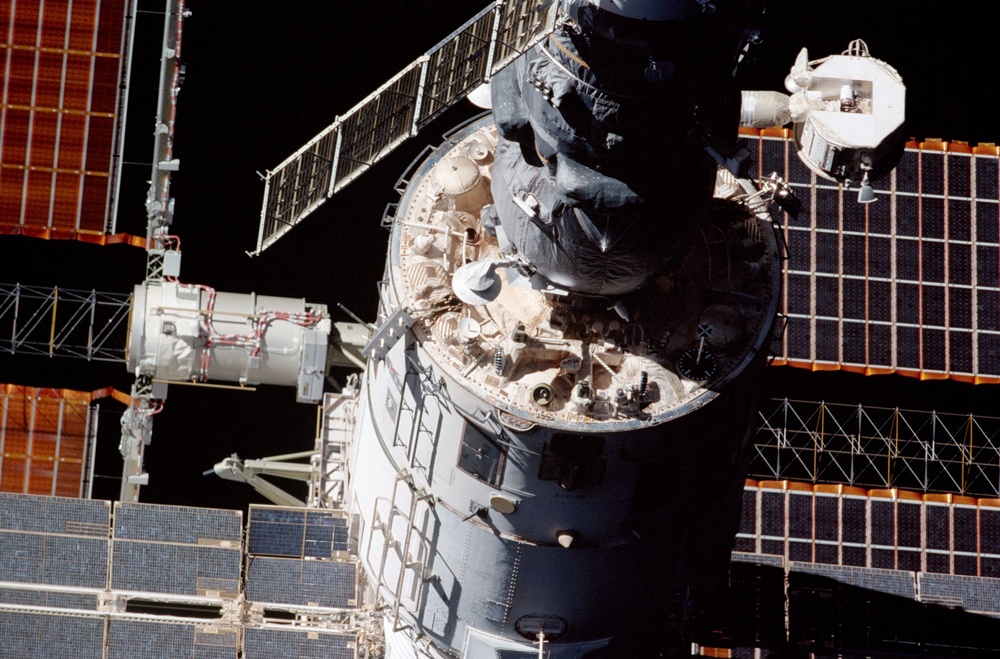 Dark view of  Zvezda Service module  and Progress M module seen during flyaround