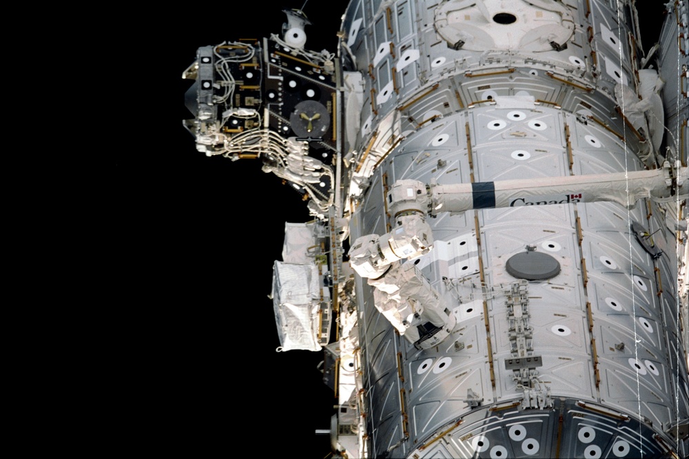 View of the PMA3, U.S. Laboratory, Node 1 and SSRMS taken during STS-108