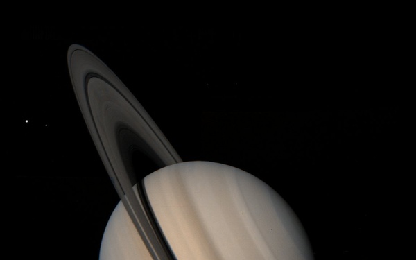 Saturn and its satellites Tethys, Enceladus and Mimas