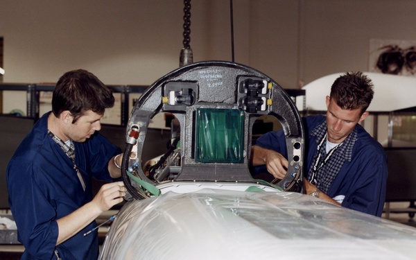 Technicians at General Atomics Aeronautical Systems, Inc., (GA-ASI) facility at Adelanto, Calif., ca