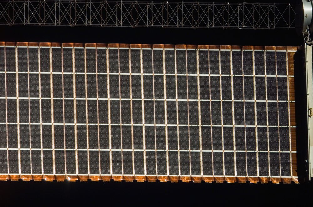 View of a P6 Solar Array taken from the orbiter after undocking from the ISS during  STS-121
