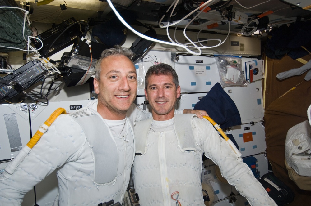 STS-125 MS1 Good and MS4 Massimino after completing EVA4